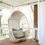 Deck Renovation with hanging chair on HGTV Fixer to Fabulous