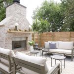 Outdoor Entertaining space with antique brick fireplace.