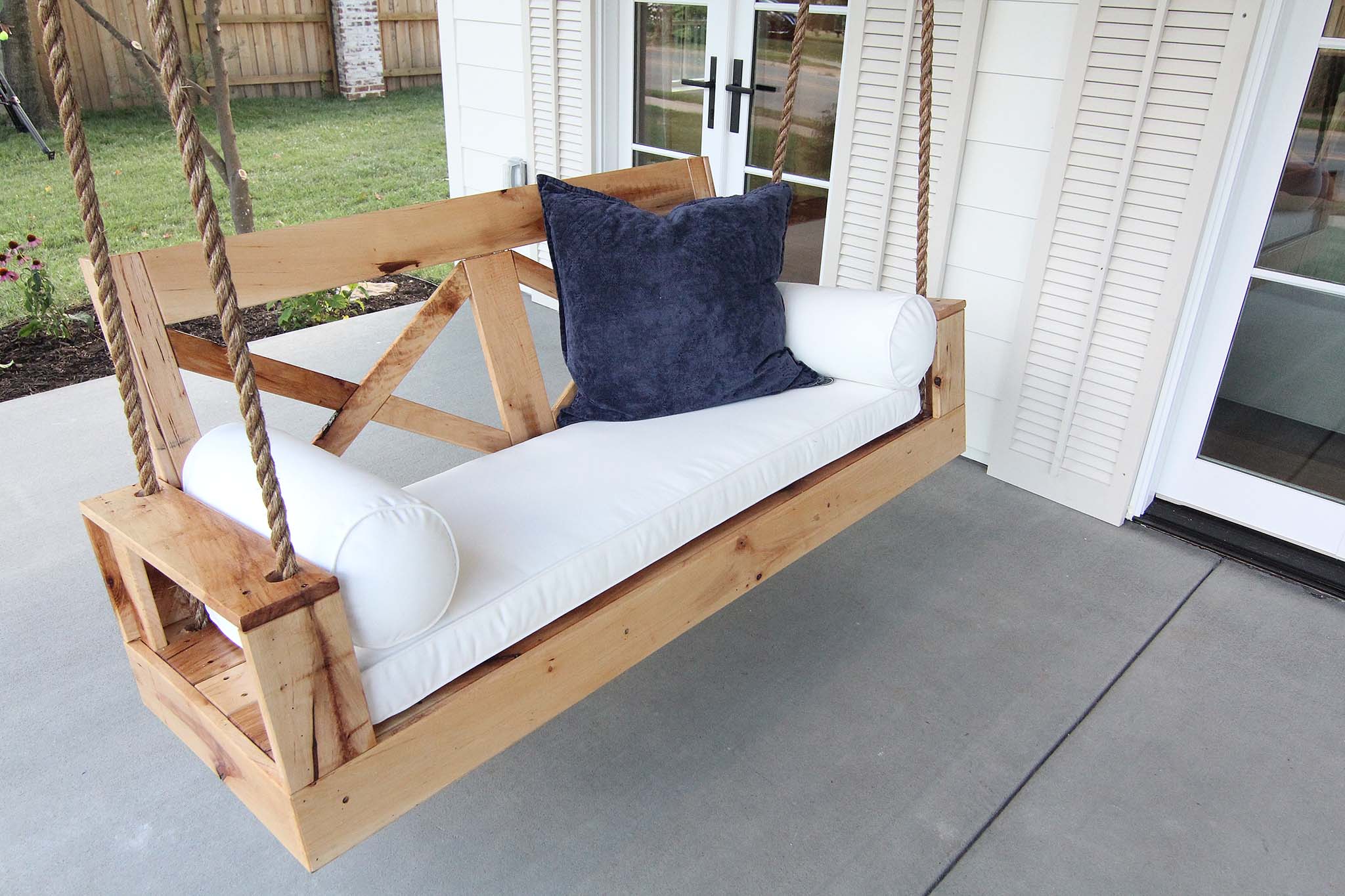 Custom built porch swing by Dave Marrs of HGTV Fixer to Fabulous.
