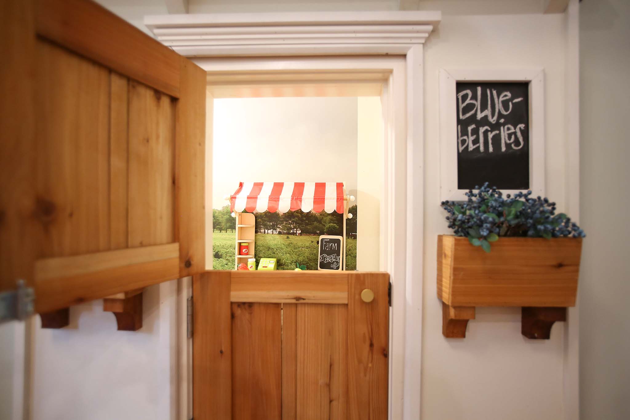 Hidden Kids Playroom created in th unused space under the stairs.