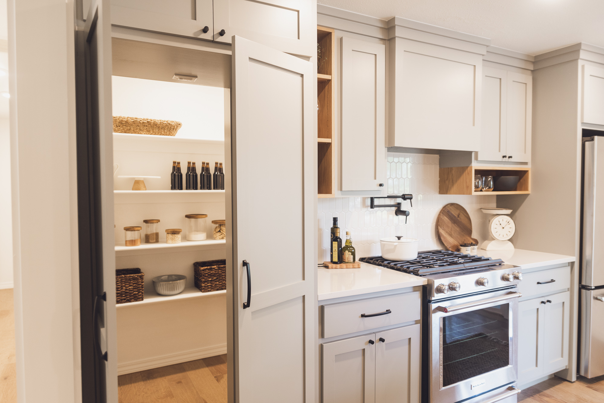 HGTV Fixer to Fabulous Kitchen Renovation with hidden walk in pantry.