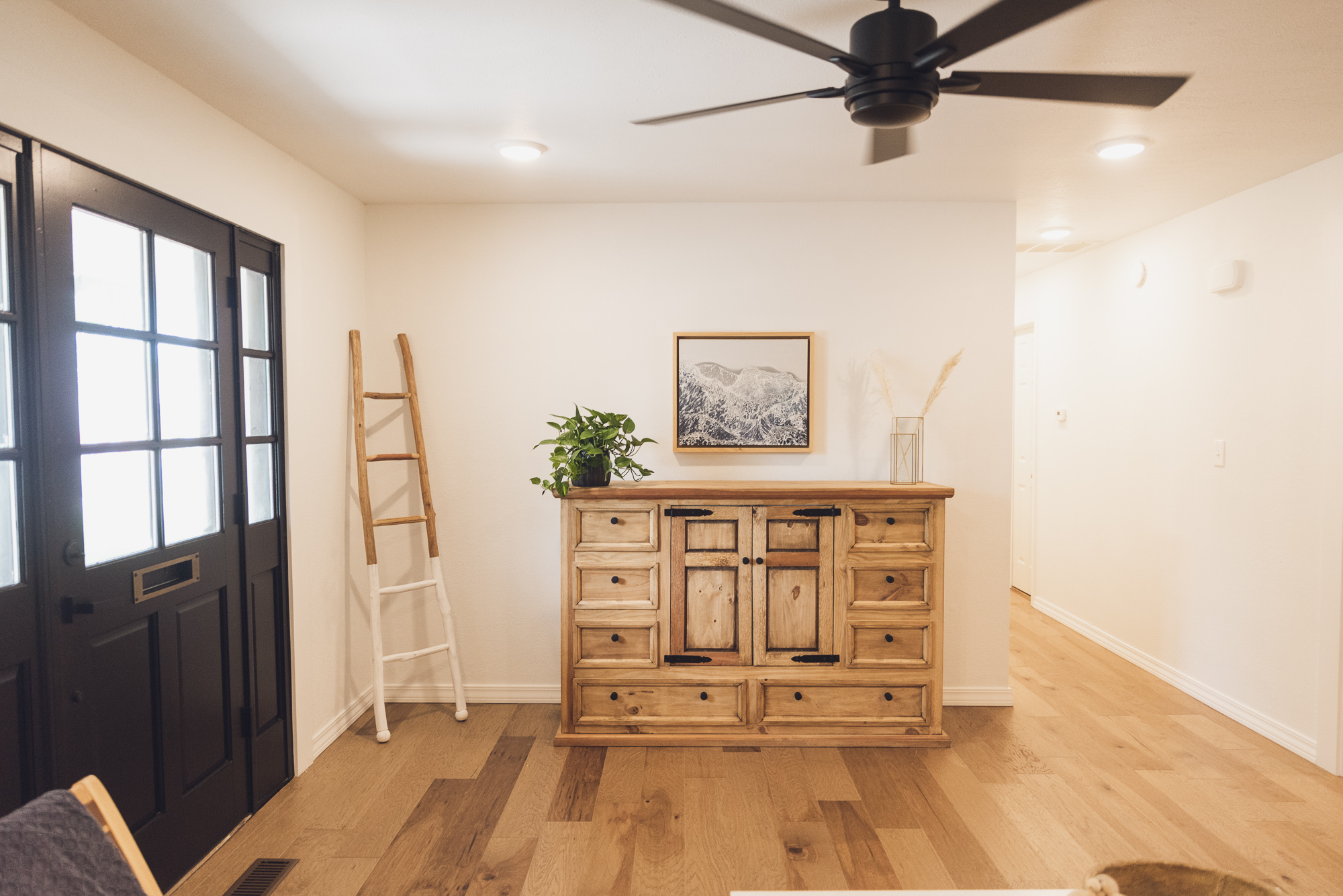 HGTV Fixer to Fabulous cabinet that houses a hidden tv.