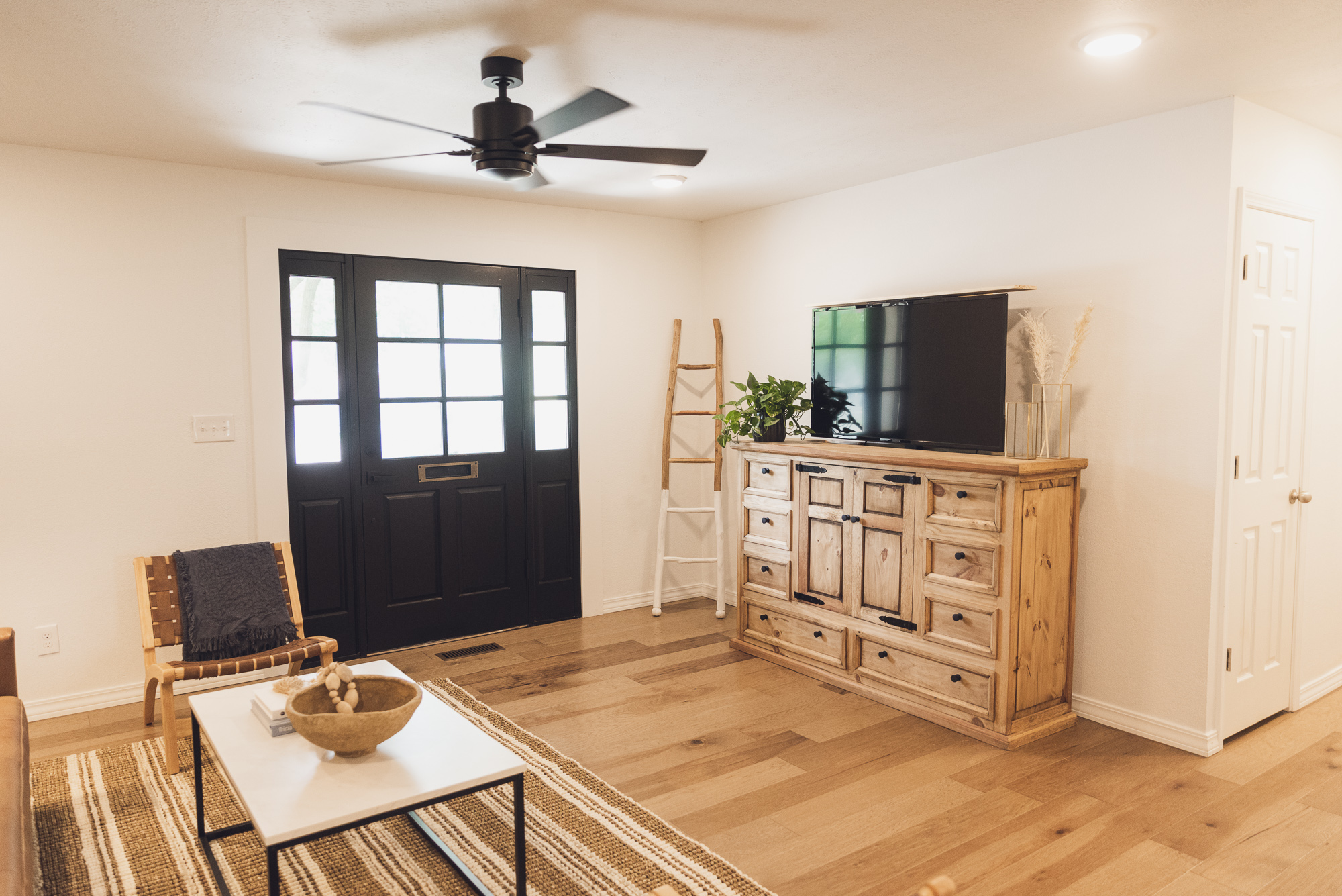 HGTV Fixer to Fabulous cabinet that houses a hidden tv.