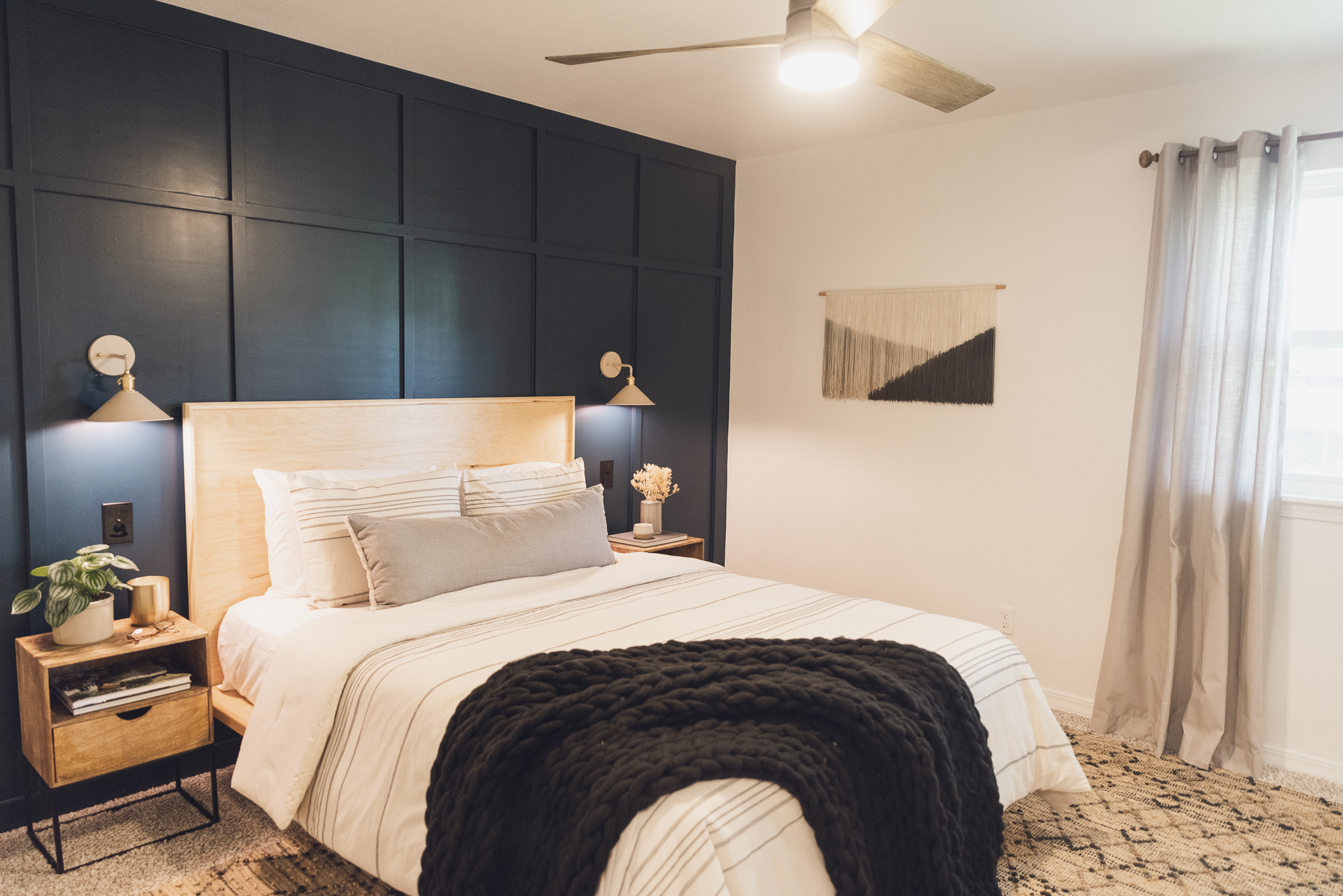 HGTV Fixer to Fabulous Bedroom Renovation with custom wall feature.