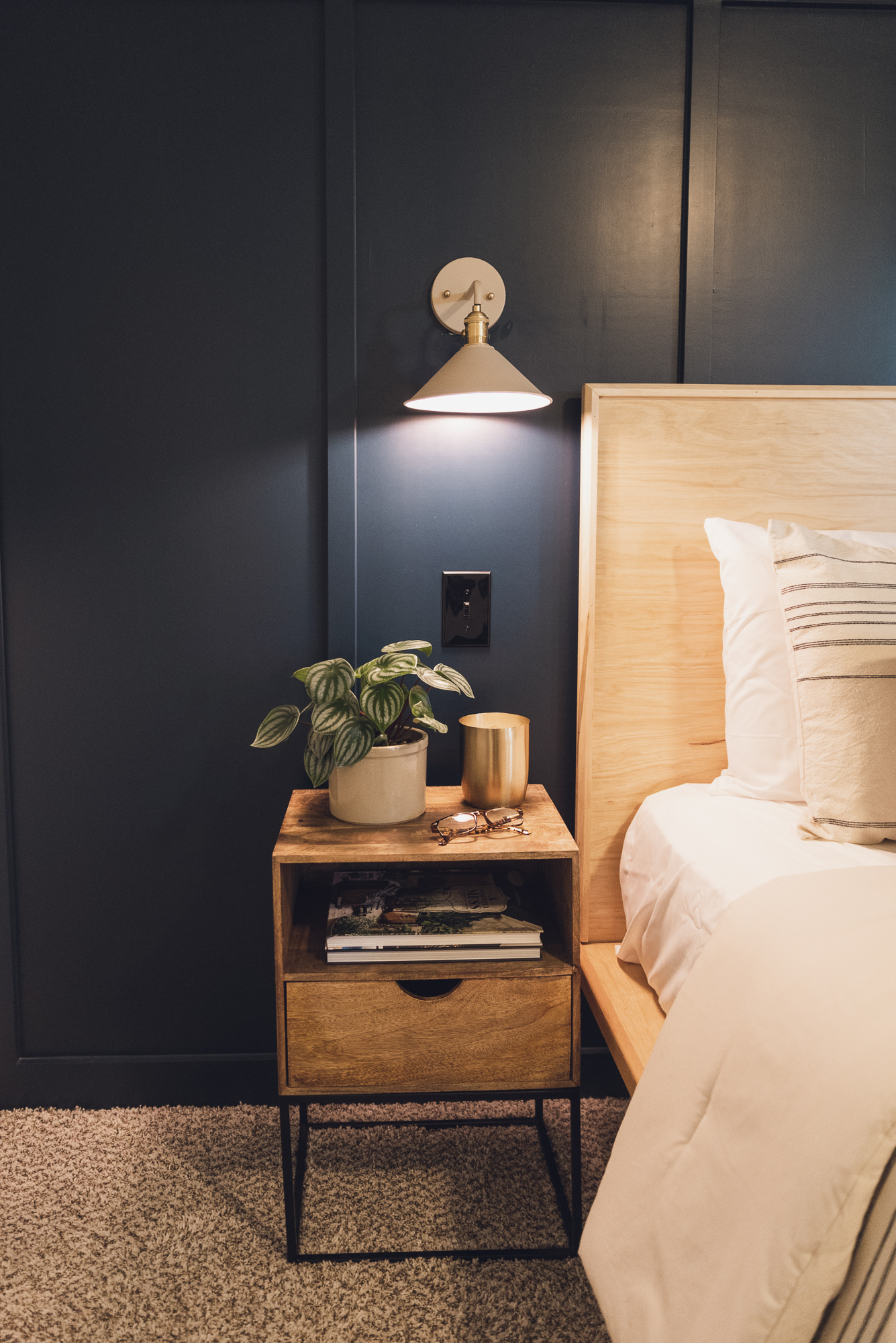 HGTV Fixer to Fabulous bedroom renovation with custom wall design.