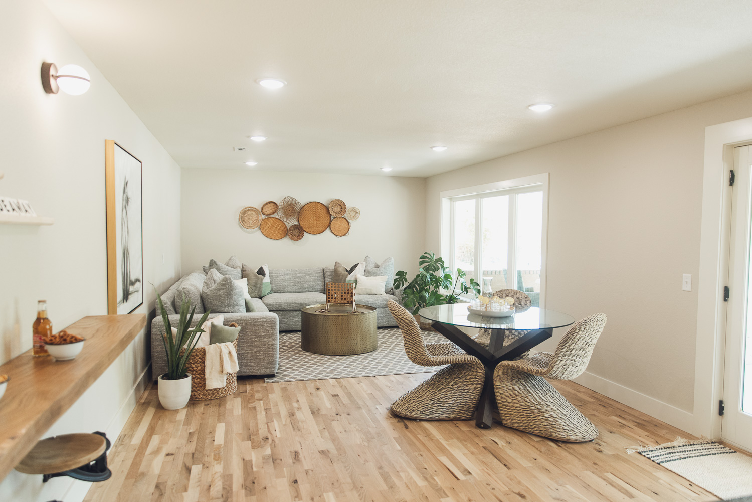 HGTV Fixer to Fabulous Lake House lower level renovation with added living area, dining and kitchenette.