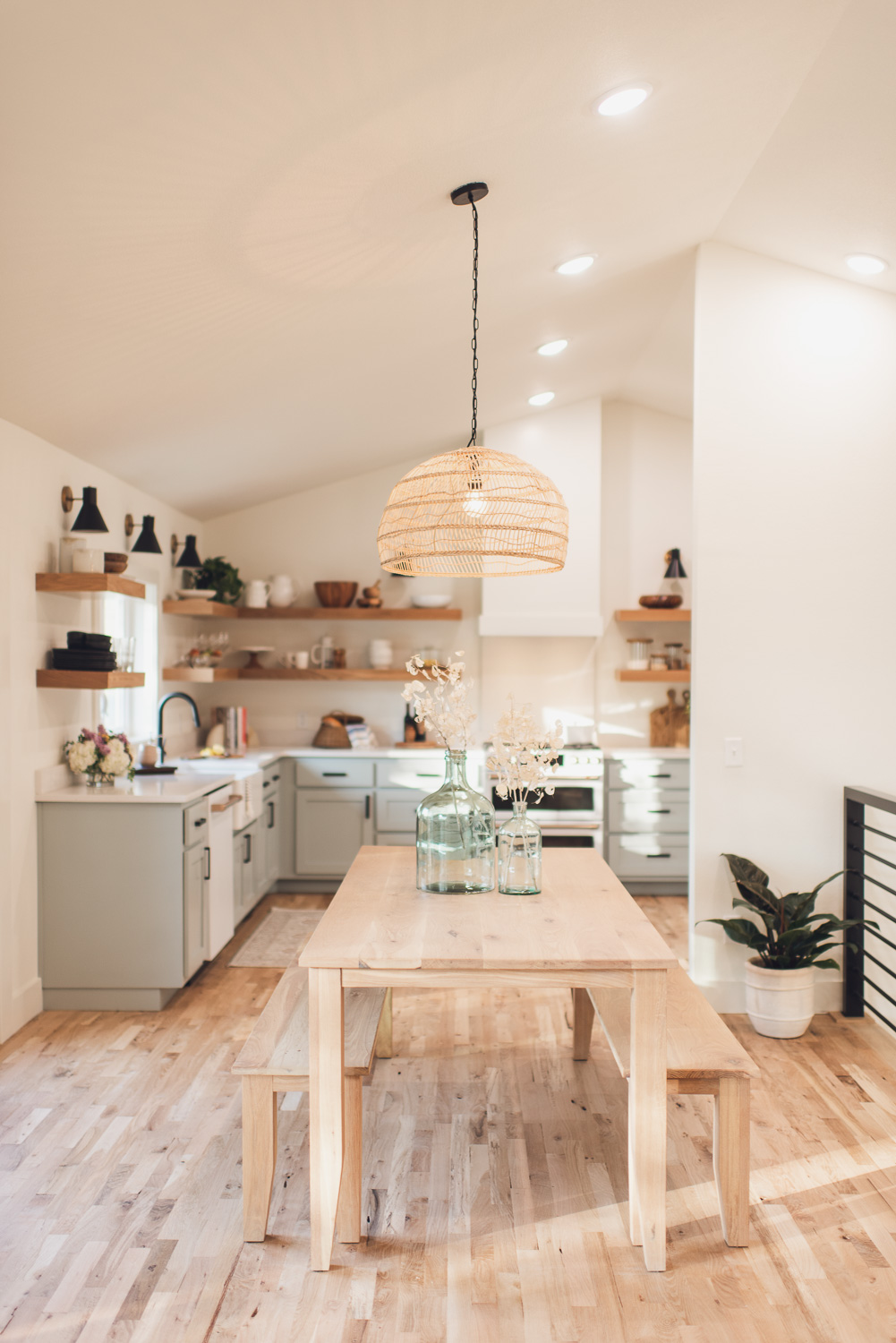 HGTV Fixer to Fabulous lake house Dining and Kitchen with open shelves.