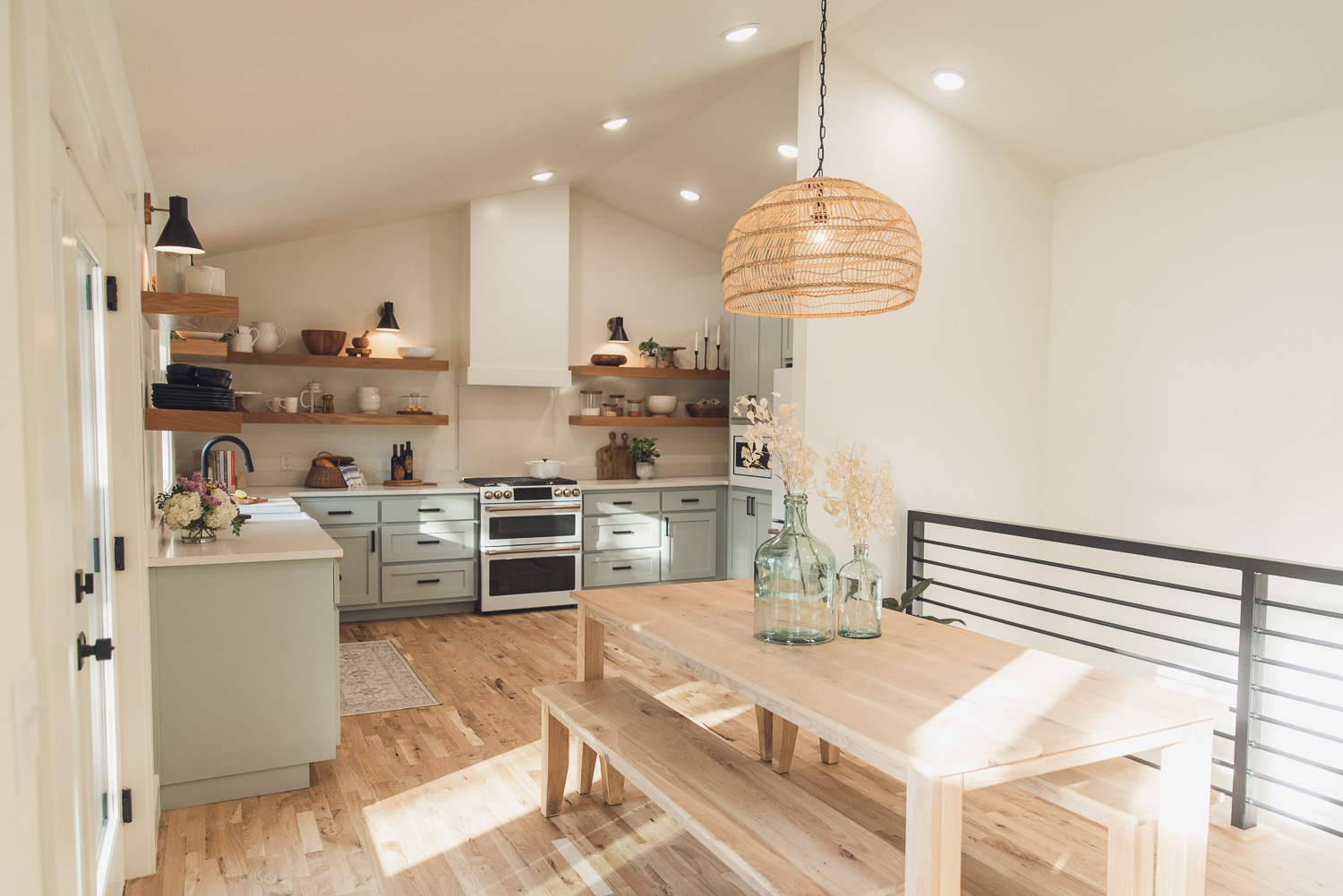 HGTV Fixer to Fabulous lake house Dining and Kitchen with open shelves.
