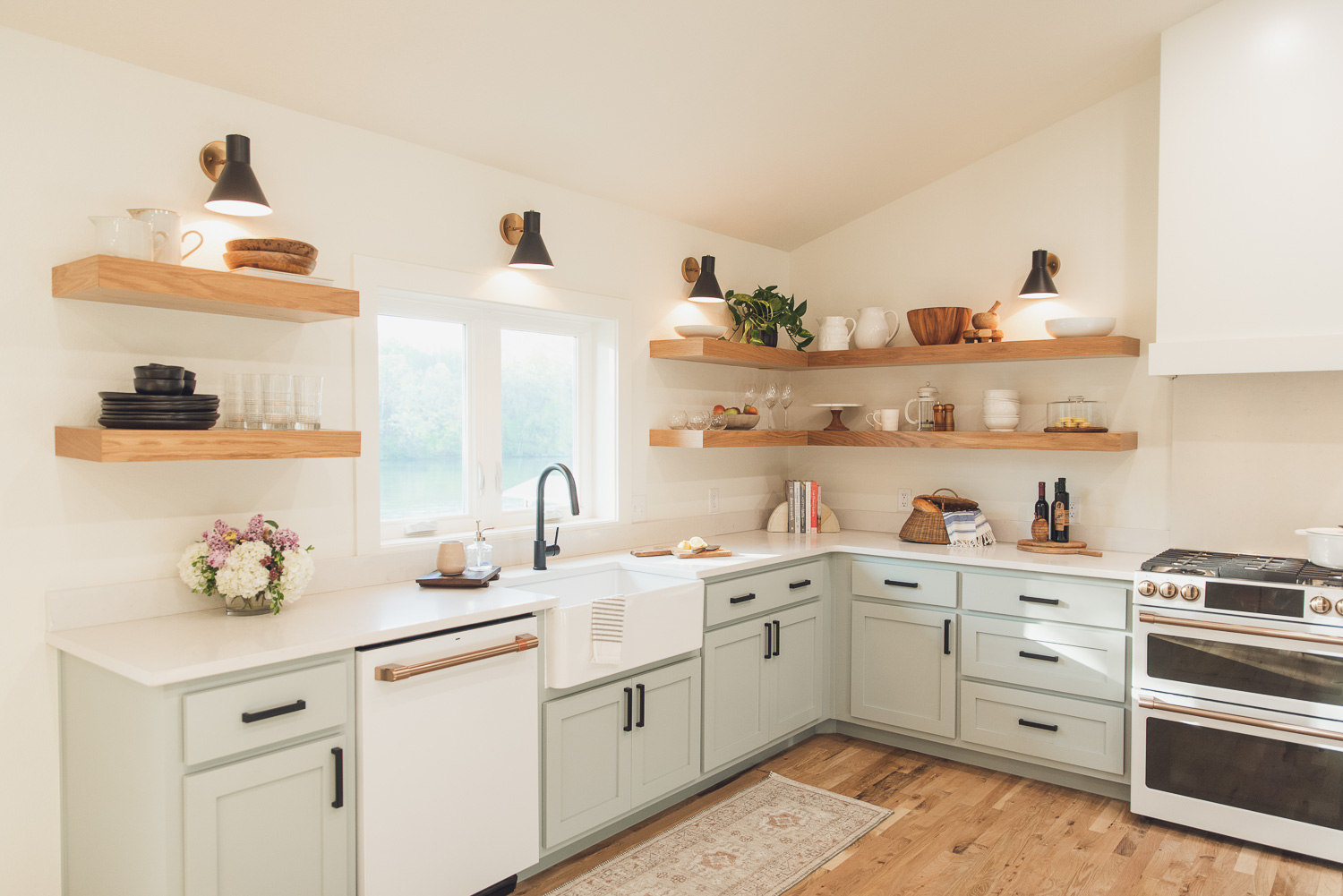 HGTV Fixer to Fabulous lake house Dining and Kitchen with open shelves.