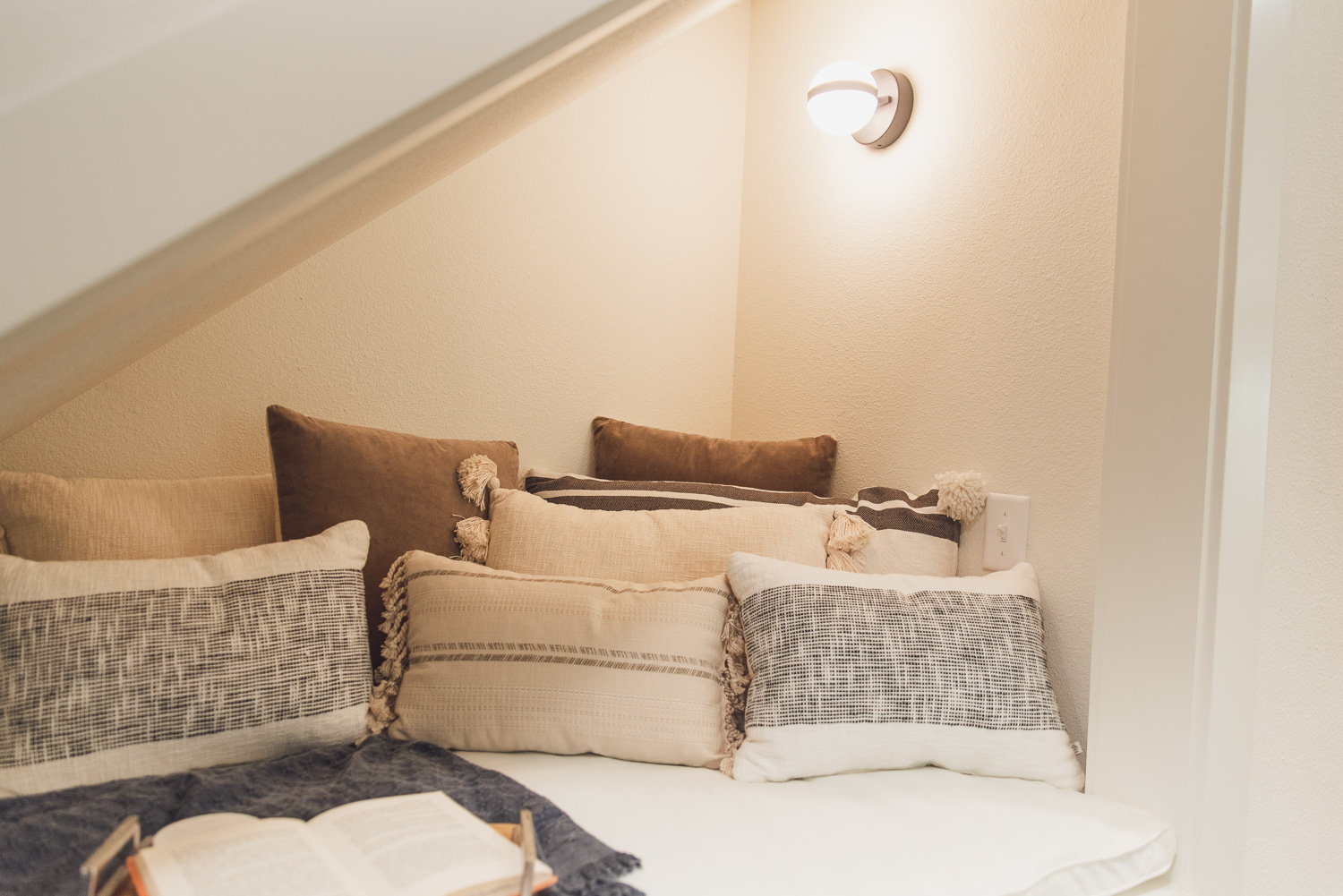 HGTV Fixer to Fabulous Built in Reading Nook under the Stairs.