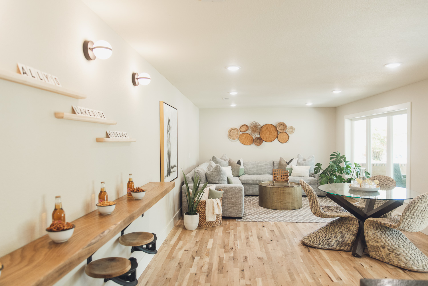 HGTV Fixer to Fabulous Lake House lower level renovation with added living area, dining and kitchenette.