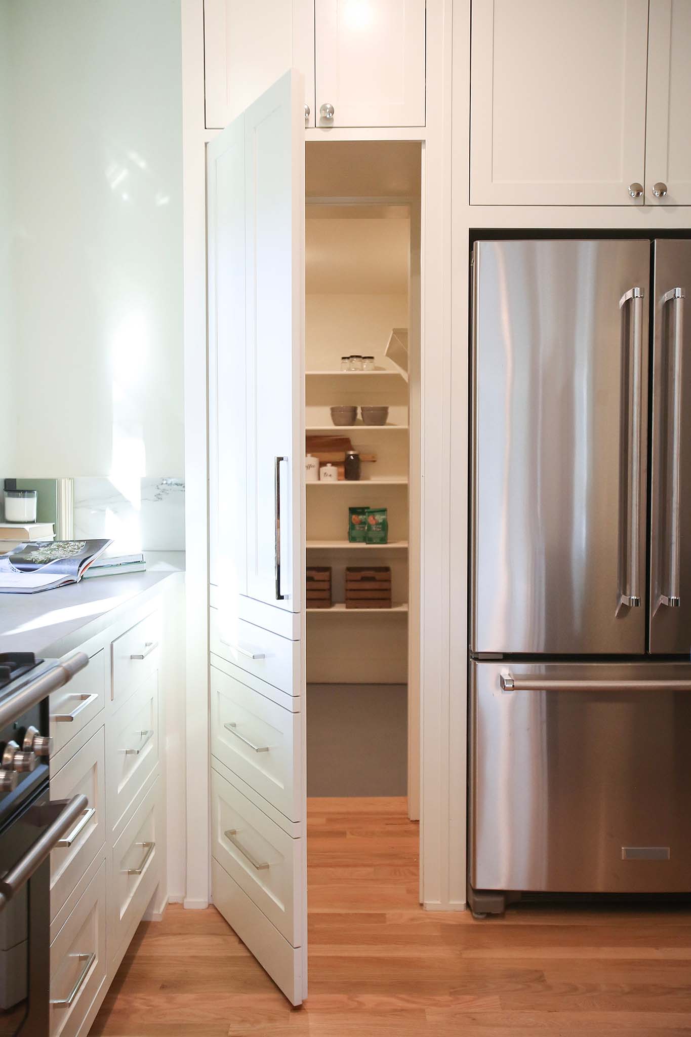 Hidden Pantry room using cabinets door on HGTV Fixer to Fabulous.