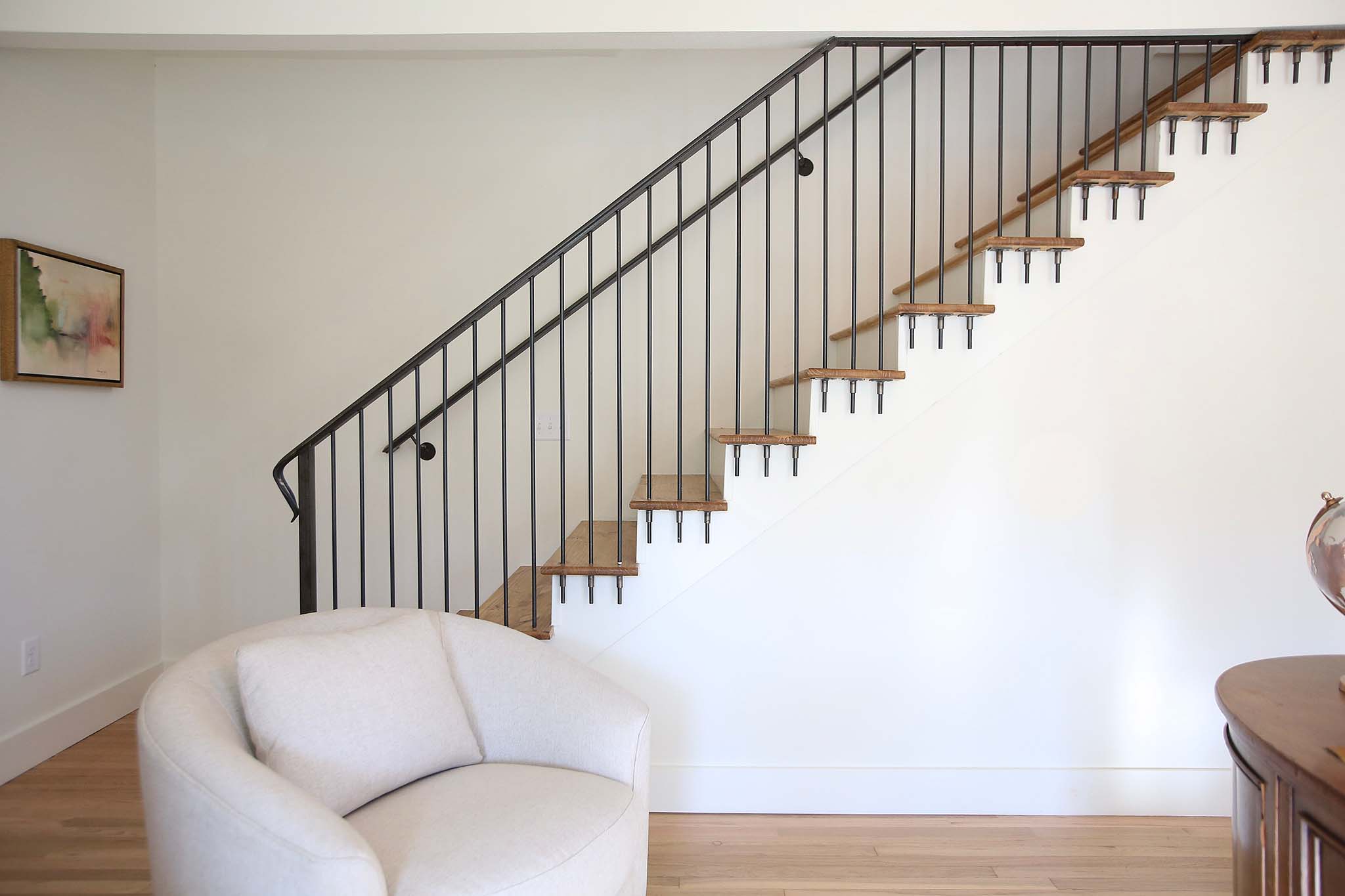 Custom Iron railing on interior staircase.