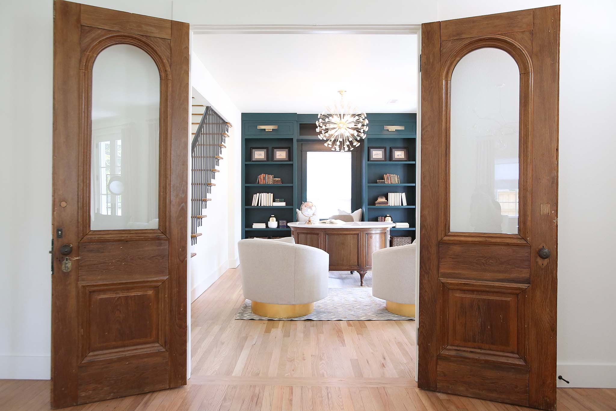 Refurbished Antique Doors make grand entrance into this home office on HGTV Fixer to Fabulous.